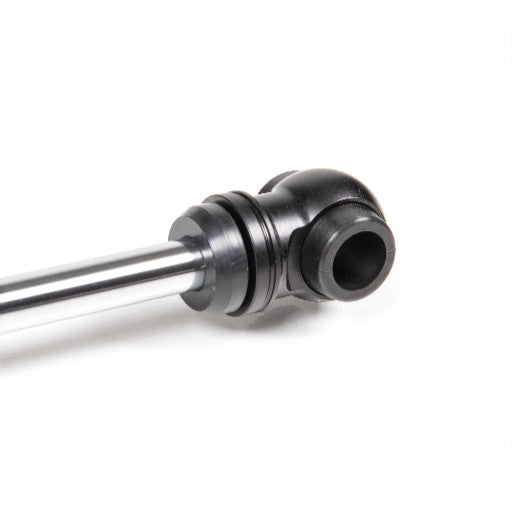 A close-up of the FOX ST103 - Ford F250/F350 2.0 IFP Steering Stabilizer, featuring a black ball joint on one end and crafted from durable 6061-T6 aluminum, isolated on a white background.