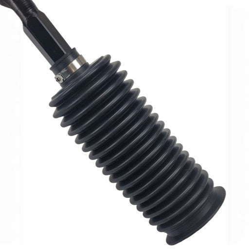 Close-up of a black rubber bellows dust cover with concentric ridges, designed to protect the Apex Chassis TR230 - Toyota 4Runner Tie Rod Assy. (LH or RH) from dirt and debris.